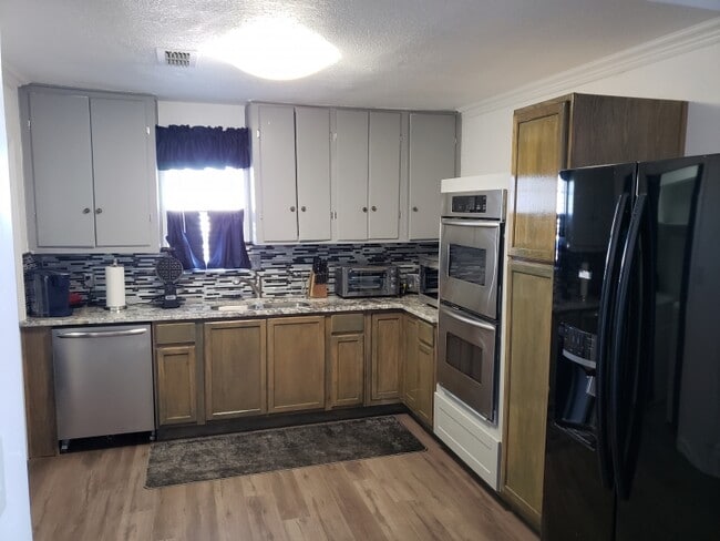 Building Photo - Furnished Extended Stay