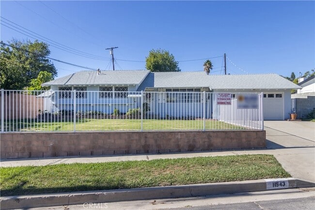 Photo - 11543 Swinton Ave