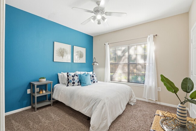 Guest room with space for night stands and a dresser for extra storage - Grand Estates at Kessler Park