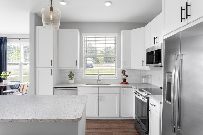 Bright and inviting modern kitchen, perfect for culinary adventures. - Lemmond Farm