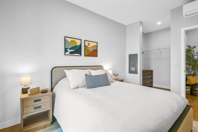 Furnished Bedroom - Urbane115 Apartments