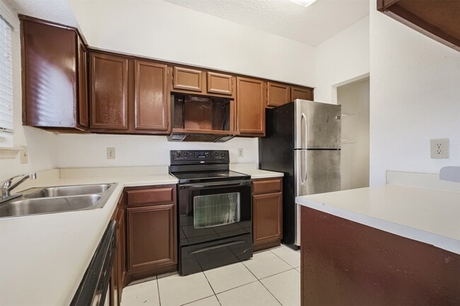 Building Photo - 12500 Brookglade Cir Unit 206