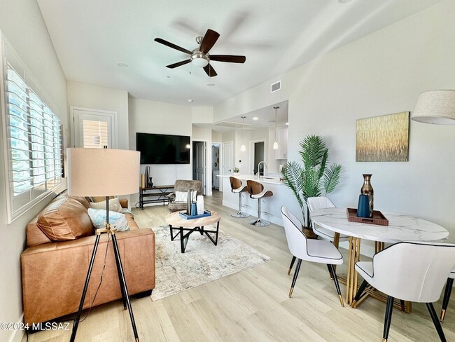 Building Photo - 2032 E River Rd Unit 200