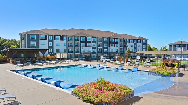 Take a refreshing dip or simply relax by the water on the sundeck or the adjoining outdoor kitchen. - Kinsley Forest