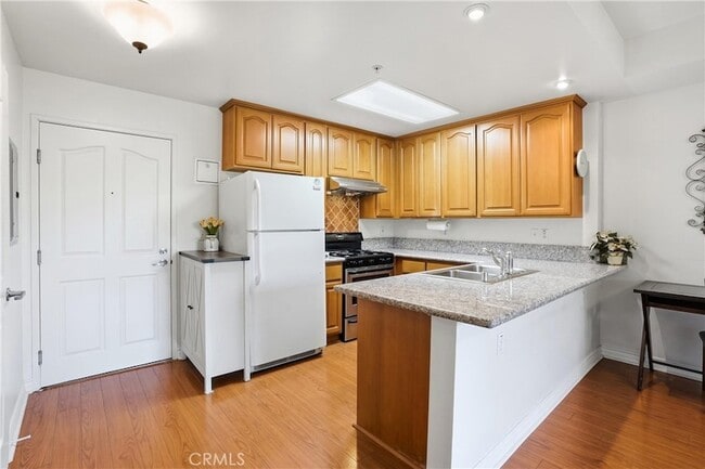 Photo - 17888 Alburtis Ave Unit A105