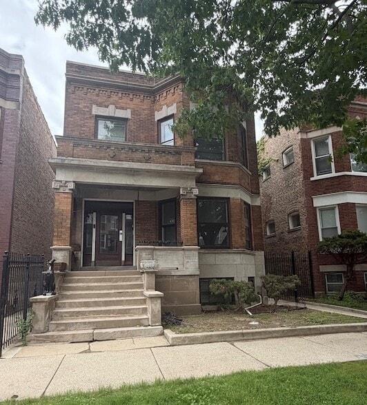 Building Photo - 6125 S Champlain Ave Unit G
