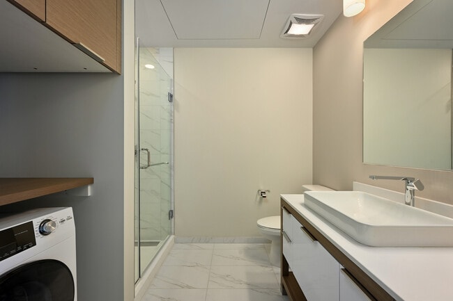 The bathroom of The Moten at Three Light Luxury Apartments - Three Light Luxury Apartments