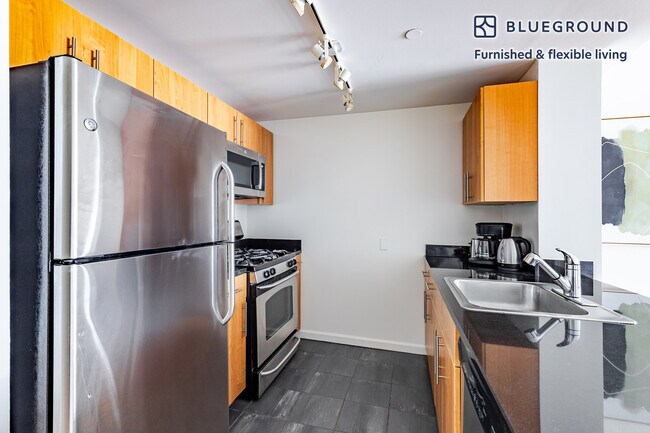 Photo - 4-75-75 48th Ave Unit FL10-ID1789