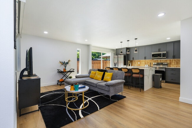 Building Photo - 905 142nd Ave SE Unit ID1234621P