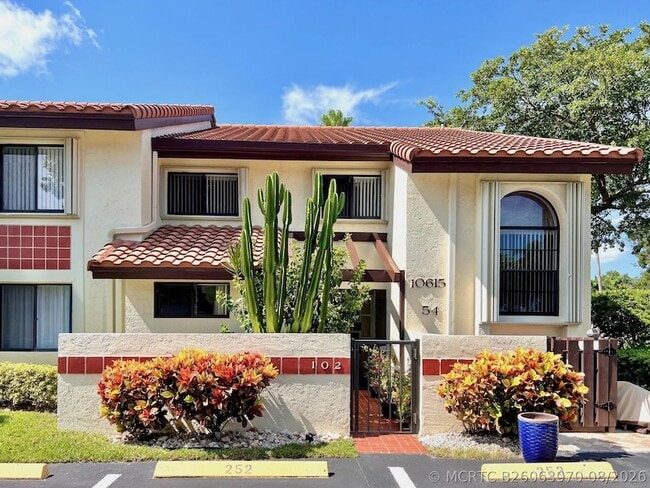 Building Photo - 10615 Ocean Palm Way Unit 102
