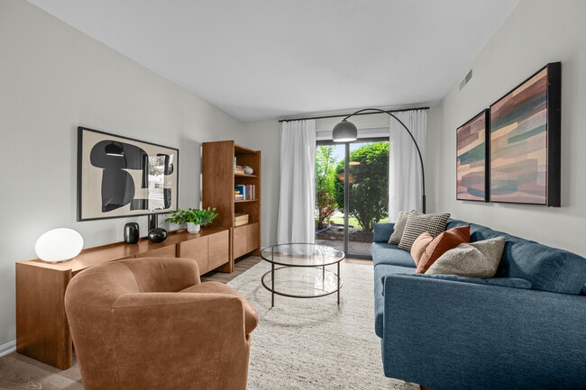 Living Room with Private Patio - Platinum Interior - Port Crossing Apartments