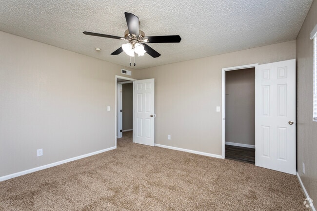 2BR, 1BA - 958SF - Primary Bedroom - Meadowbrook Apartments