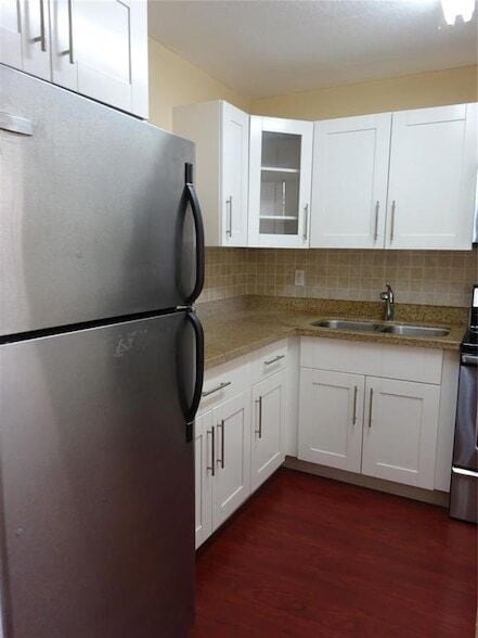 Building Photo - 6050 NW 64th Ave Unit 307
