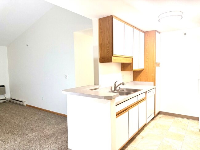 Kitchen with peninsula counter. - The Terrace at Cedar Glen: Fully Equipped 1–2 BR | 1 Bath | Cross Plains, WI Apartments for Rent ...