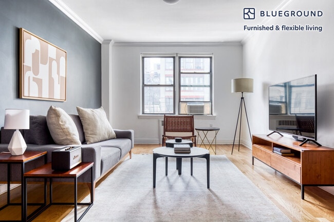 Building Photo - 108 W 15th St Unit FL5-ID205