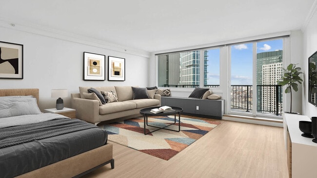 Living Room with Hard Surface Flooring - The Towers at Longfellow