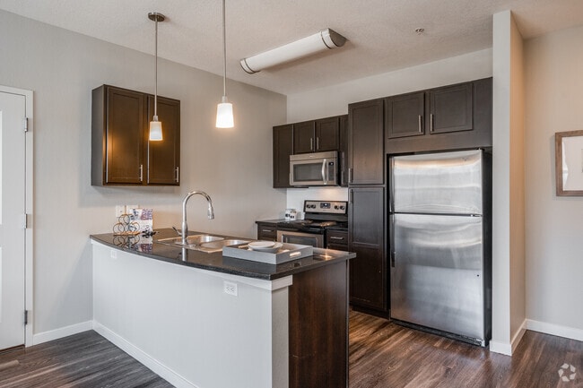 1 BR, 1 BA - 630 SF - Monaco Row