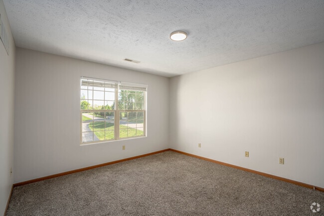 2BR, 2BA - 1,100SF - Primary Bedroom - Sunny Hill Villas