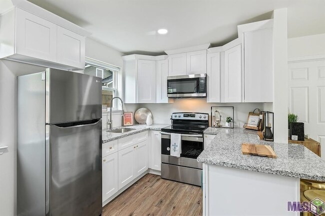 Building Photo - 212 Centerville St NE Unit 4