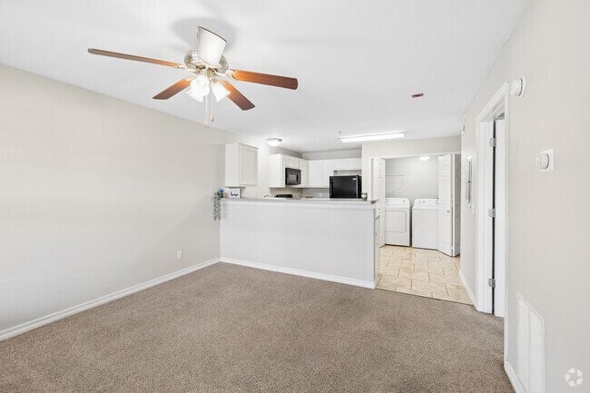 1BR, 1BA - 740SF -Living Room and Kitchen - Pryor Creek