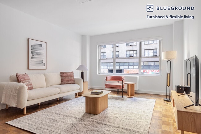 Building Photo - 136 E 55th St Unit FL2-ID1786