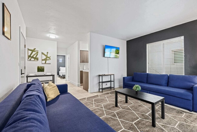 Building Photo - 7340 Harding Ave Unit FL1-ID1240909P