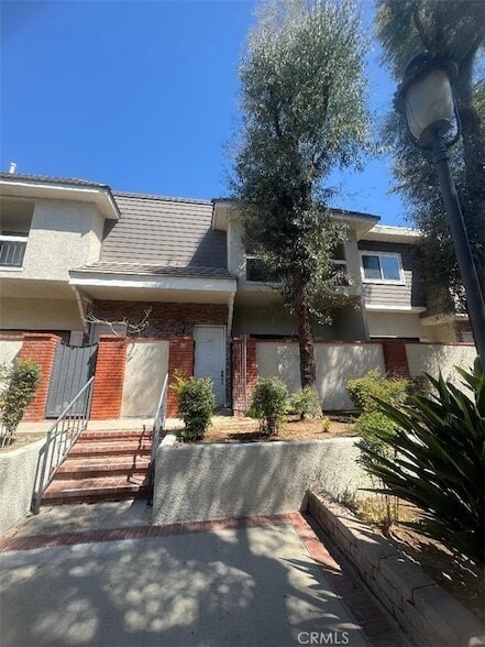 Building Photo - 10201 Mason Ave Unit 113