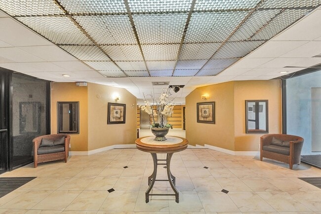 Building Photo - 3800 N Hills Dr Unit 208
