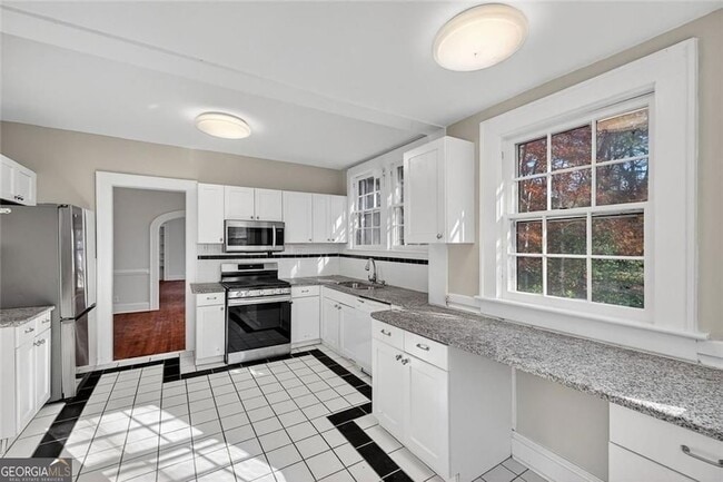 Photo - 444 Burlington Rd NE Unit 1