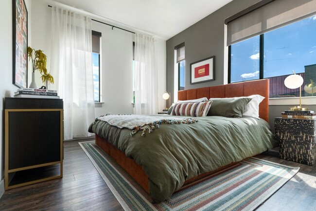Spacious Bedroom with Plenty of Natural Light and Wood Flooring - Lamar Union
