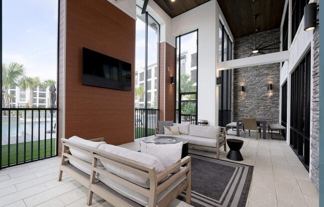 Step into the modern elegance of The Edison Daytona Apartments. With spacious lounges, natural light, and sleek design, this community offers a perfect blend of comfort and style. Explore your new home today! - The Edison Daytona Apartments