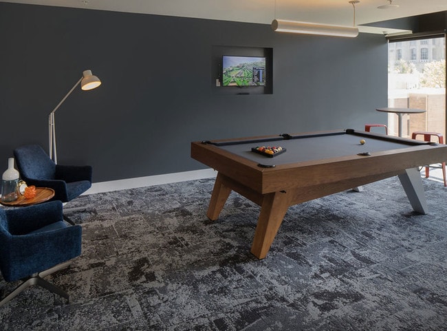 Clubroom with gaming area - AMLI Arts Center