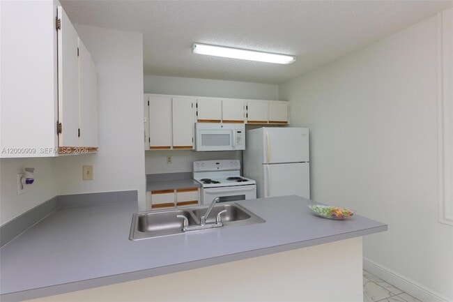 Photo - 18304 NW 68th Ave Unit L