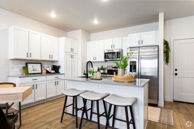 3BR, 2.5BA - 1,580SF - Kitchen - Drexler Townhomes at Holbrook Farms