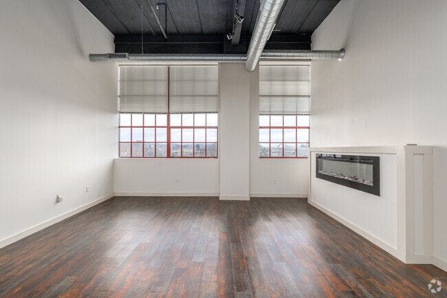 2BR, 2BA - 1,525SF - Living Room - Herald Commons Apartments