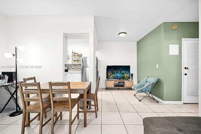 Building Photo - 7625 Harding Ave Unit 1