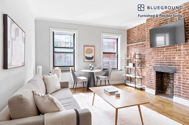 Building Photo - 273 W 10th St Unit FL4-ID897