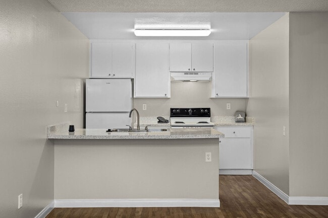 Kitchen at Bay Breeze Apartments in Costa Mesa, CA - Bay Breeze