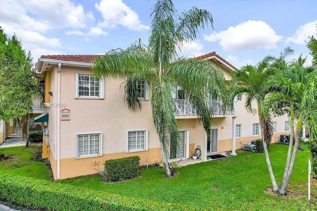 Building Photo - 6900 NW 179th St Unit 1041