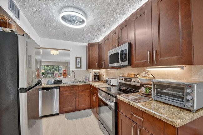 Building Photo - 10173 Mangrove Dr Unit 2040