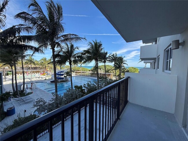 Building Photo - 9273 Collins Ave Unit 207