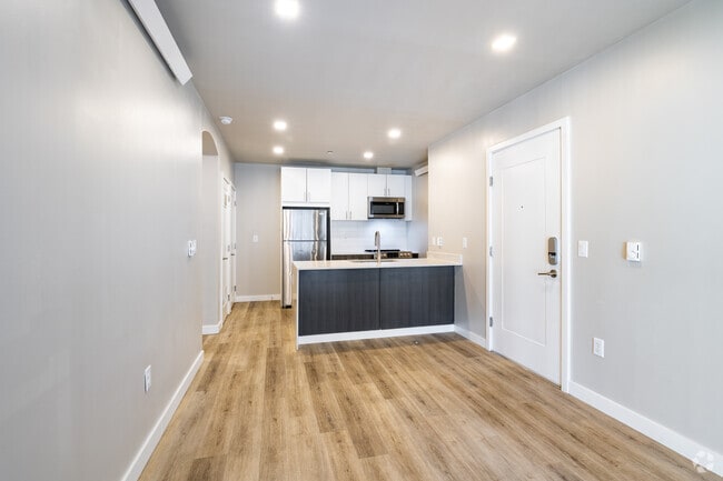 2BR, 2BA - 804SF - Living Room / Kitchen - Bighorn Crossing