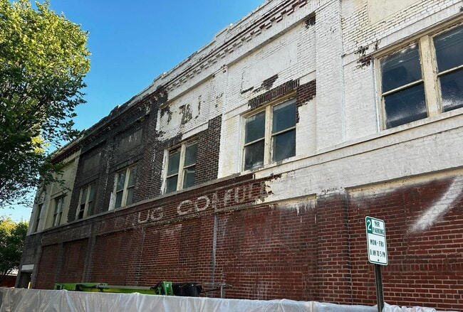 Removing the old paint during renovation - Hicks Block Lofts