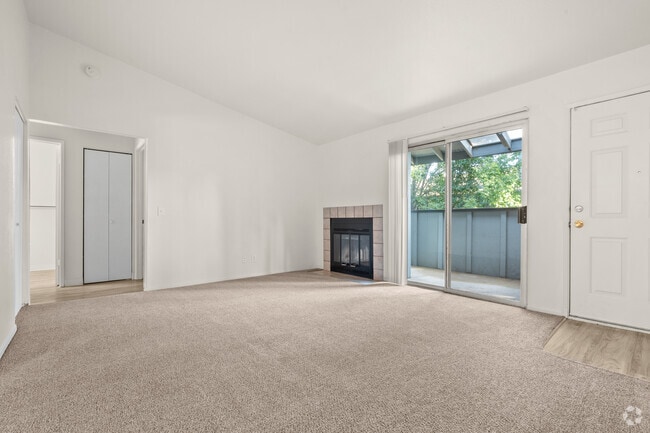 2BR, 2BA - 950SF - Living Room - College Glen Apartments