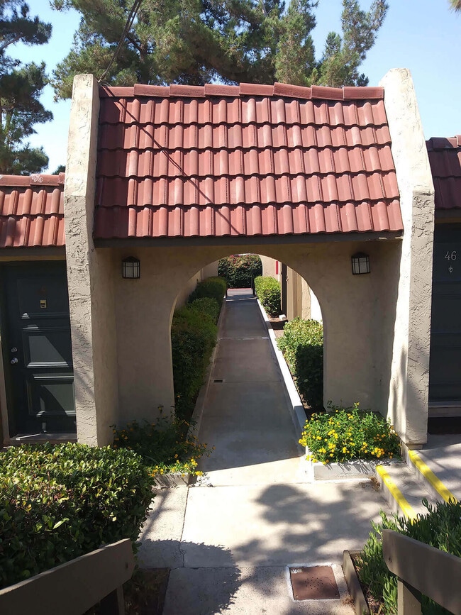 Transition walkway between buidings at Teton Pines Apartments in Escondido, California. - Teton Pines Apartments