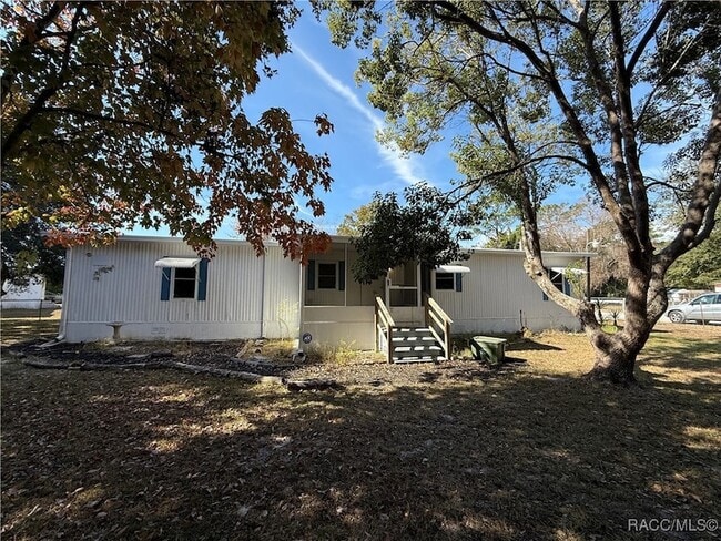 Building Photo - 7362 S Spartan Ave