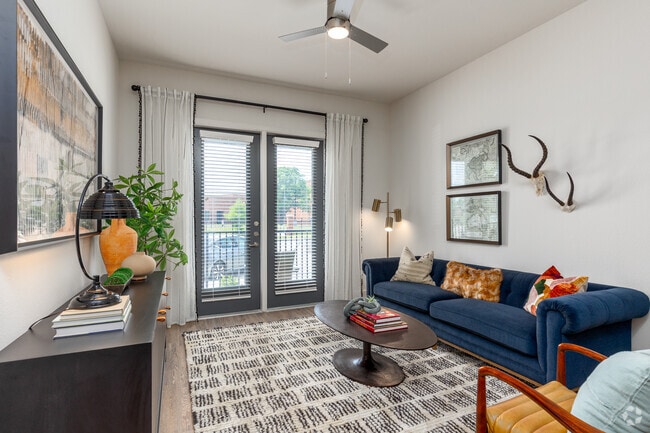 1BR, 1BA - 746SF | A2 - Living Room - The Mill Old Town