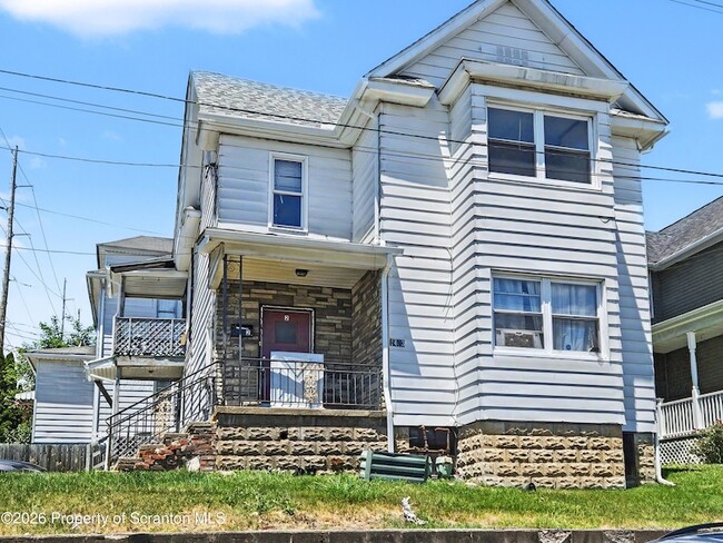 Building Photo - 1403 N Sumner Ave Unit 2