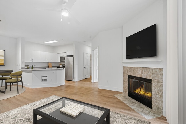 Renovated Package I kitchen and living room with hard surface flooring - eaves RockMeadow