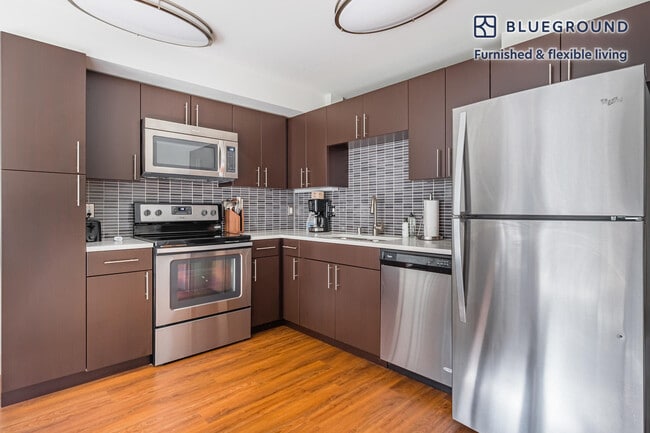 Photo - 10595 Main St Unit FL4-ID716